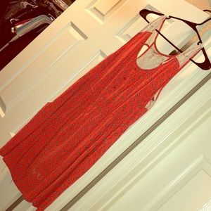 Knee length orange dress with pockets